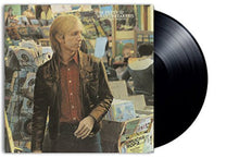 Cargar imagen en el visor de la galería, Cover art for Tom Petty and The Heartbreakers album 'Hard Promises' featuring a photo of Tom Petty in a record store.