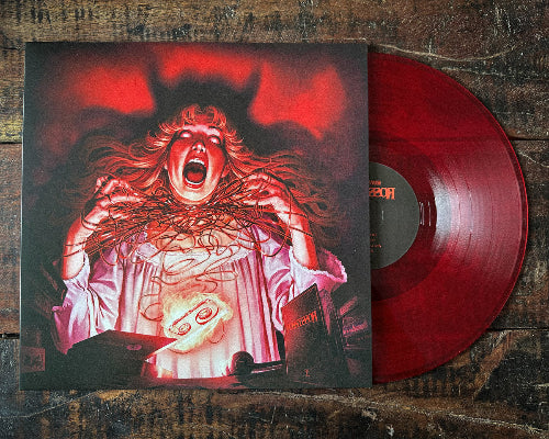 Artwork for the album 'Possessor' by Trippelganger featuring a person with long, flowing hair in a dark setting, with a blood-red vinyl record sleeve in the background.