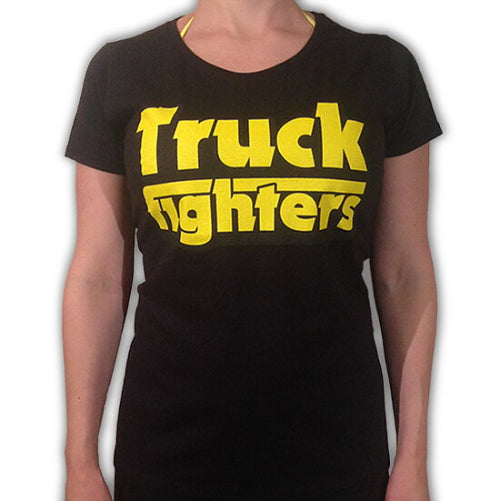 Black t-shirt with yellow 'Truck Fighters' text worn by a person on a white background