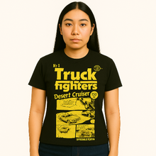 Load image into Gallery viewer, Person wearing a black t-shirt with yellow text and graphics on a white background