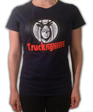 Cargar imagen en el visor de la galería, Person wearing a black t-shirt with &#39;Truckfighters&#39; logo and text.