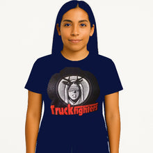 Cargar imagen en el visor de la galería, Person wearing a navy blue t-shirt with &#39;Truckfighters&#39; graphic design on a white background