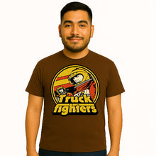 Load image into Gallery viewer, Man wearing a brown t-shirt with &#39;Truck Fighters&#39; graphic design on a white background