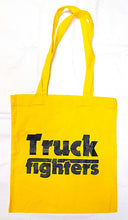 Charger l'image dans la galerie, Yellow tote bag with 'Truck fighters' text on a white background