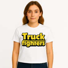 Load image into Gallery viewer, Person wearing a white t-shirt with 'Truck fighters' text in yellow and black.