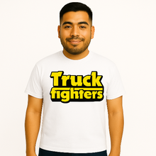 Load image into Gallery viewer, Man wearing a white t-shirt with 'Truck fighters' text on a white background