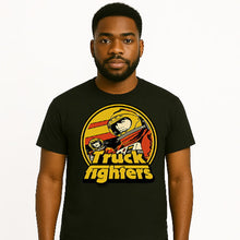 Cargar imagen en el visor de la galería, Man wearing a black t-shirt with 'Truckfighters' graphic design on a white background