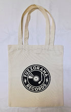 Cargar imagen en el visor de la galería, Beige tote bag with 'Fuzzoraxa Records' logo on a white background