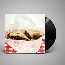 Cargar imagen en el visor de la galería, Vinyl record with a sandwich image on the cover against a gray background
