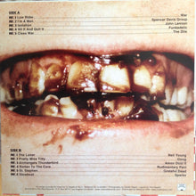 Cargar imagen en el visor de la galería, Album cover with close-up of mouth and teeth, featuring text on a beige background