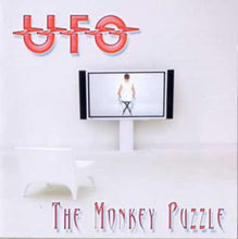Charger l'image dans la galerie, Album cover for 'The Monkey Puzzle' by UFO with a TV screen and person figure.