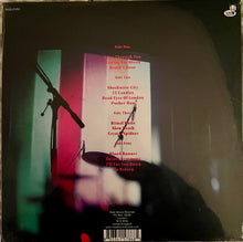 Charger l&#39;image dans la galerie, Album cover with text and silhouette of a microphone