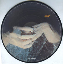 Load image into Gallery viewer, Vinyl record with a black and white image of hands holding a record, featuring the text '...very umble'.