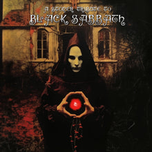 Cargar imagen en el visor de la galería, Album cover with a hooded figure holding a red ball, inspired by Black Sabbath, with a dark and eerie background.