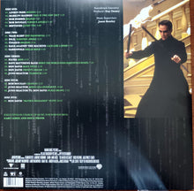 Cargar imagen en el visor de la galería, Vinyl record cover with a character from 'The Matrix' and a list of tracks on the left.