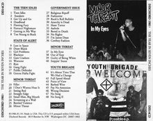 Load image into Gallery viewer, Album cover and tracklist for 'The Year in Seven Inches' featuring Minor Threat and Youth Brigade.