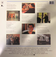 Load image into Gallery viewer, Back cover of a movie album with images and text