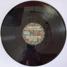 Cargar imagen en el visor de la galería, Vinyl record with a label on a white background