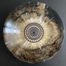 Load image into Gallery viewer, Vinyl record with a spiral design on a black background
