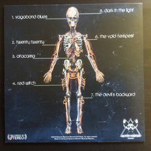 Cargar imagen en el visor de la galería, Album cover with skeleton illustration and tracklist on a dark background