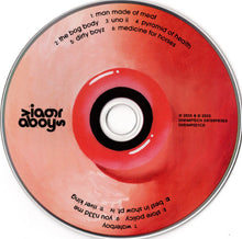 Charger l&#39;image dans la galerie, CD with red and black design featuring album tracklist and branding on a white background