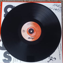 Charger l'image dans la galerie, Vinyl record with a red label on a white background