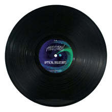 Load image into Gallery viewer, Black vinyl record with a dark blue and green label over a white background