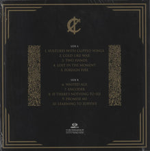 Load image into Gallery viewer, Back cover of a vinyl record with tracklist and ornate design elements.