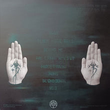 Charger l&#39;image dans la galerie, Two hands with black symbols on a dark background with text.