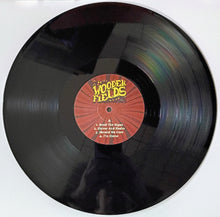 Charger l'image dans la galerie, Vinyl record with a red label on a white background