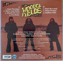 Charger l'image dans la galerie, Album cover for 'Wooden Fields' with three band members and tracklist on a brown background