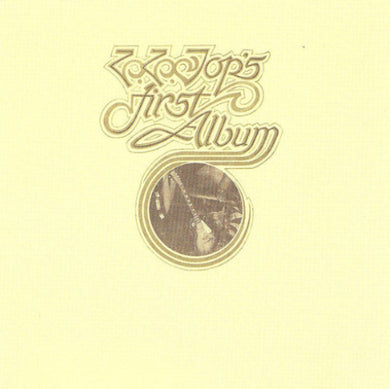 Album cover with text 'ZZ Tops First Album' on a beige background