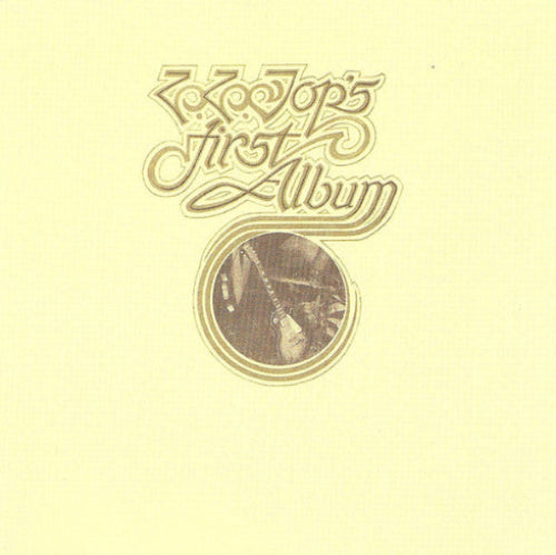 Album cover with text 'ZZ Tops First Album' on a beige background