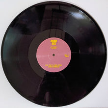 Load image into Gallery viewer, Vinyl record with a pink label on a white background