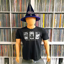 Load image into Gallery viewer, A mannequin wearing a black “King Buffalo” T-shirt and a purple pointed wizard hat, standing in front of shelves filled with vinyl records. The shirt features three illustrated tarot-style panels on the front.