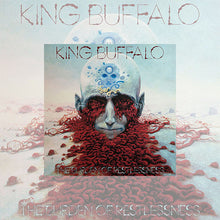 Load image into Gallery viewer, Surreal album artwork featuring a pale, bald human head centered against a muted, desert-like background. The top of the head is transparent like a dome, containing abstract blue shapes, while thick, red, tangled organic material pours out from the eyes and spreads across the ground. The band name “King Buffalo” appears at the top, and the album title “The Burden of Restlessness” is shown below.