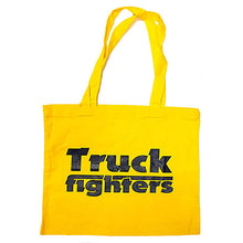 Load image into Gallery viewer, A bright yellow canvas tote bag with long handles, featuring the words 'Truck fighters' printed in a bold black font on the front, set against a plain white background.